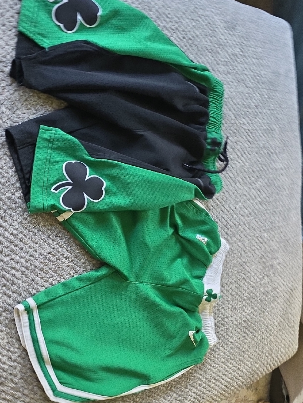 Two Pairs Authentic Youth Boston Celtics Basketball Shorts.